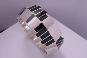 bespoke art deco bangle handmade in silver and vitreous enamel by charmian beaton design