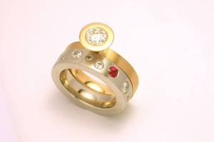 Bespoke platinum and 18ct yellow gold wedding ring and engagement ring suite handmade by charmian beaton design