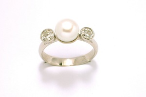 Handmade pearl and diamond engagement ring in 18ct white gold by charmian beaton design