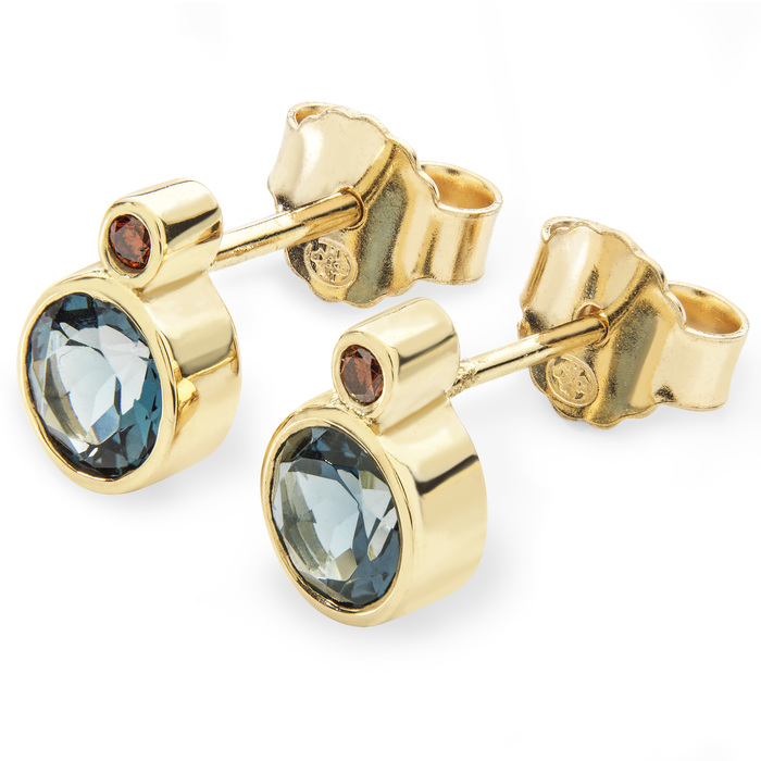 Tiggy studs handmade in 18ct yellow gold set with London blue topaz and cognac diamonds.